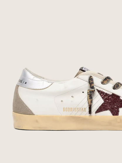 Superstar with burgundy glitter star and silver heel counter